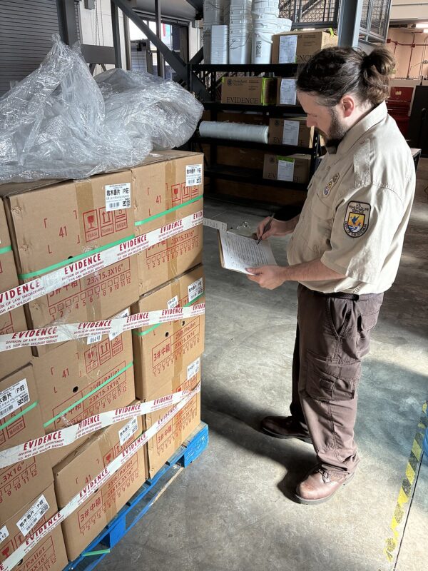 pre-shipment inspection for edible oil - inspector checking cargo